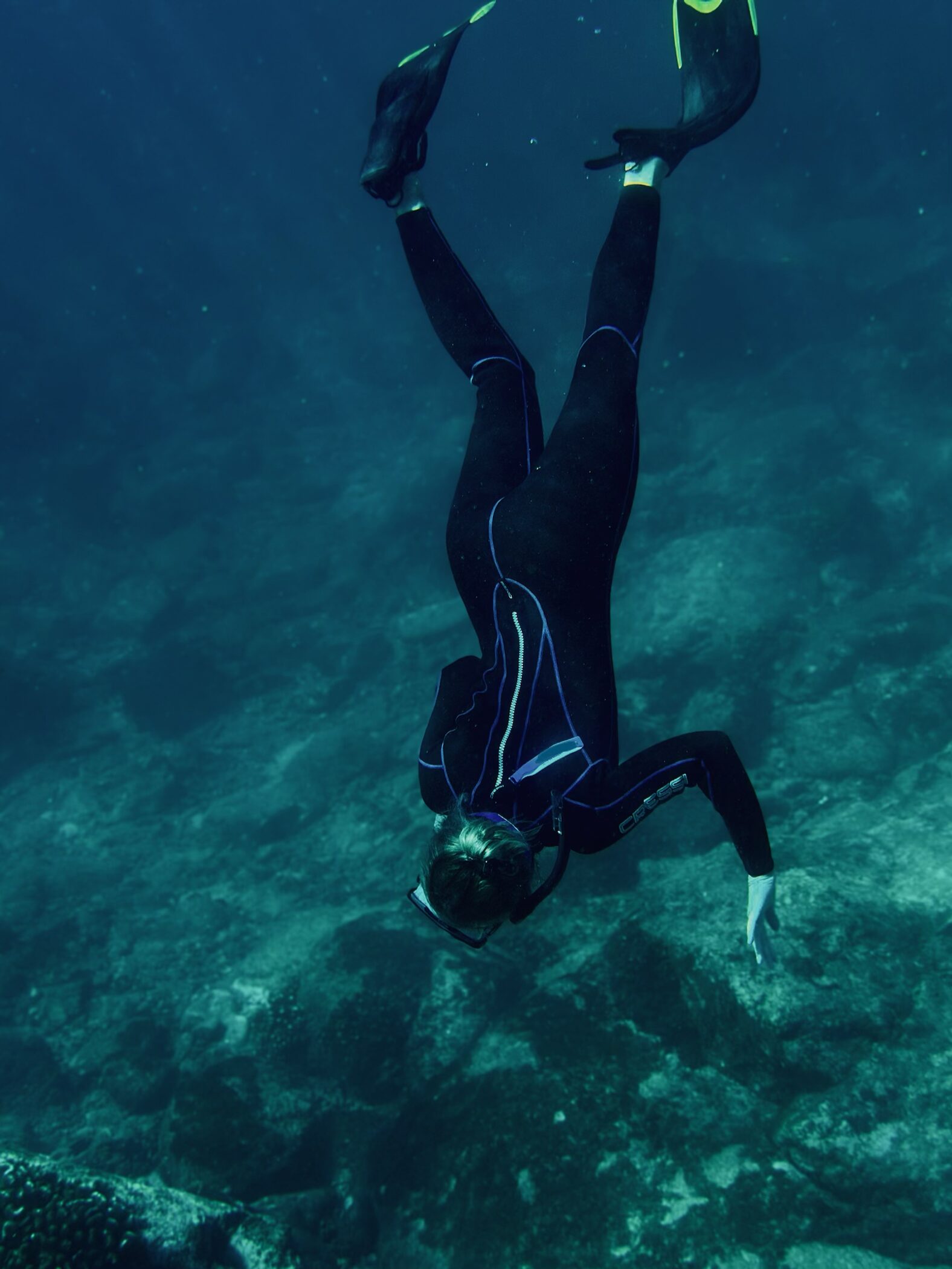 woman snorkeling in la paz during the night